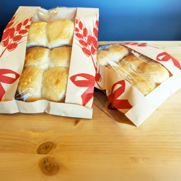 Pack of golden mini sweet bread rolls